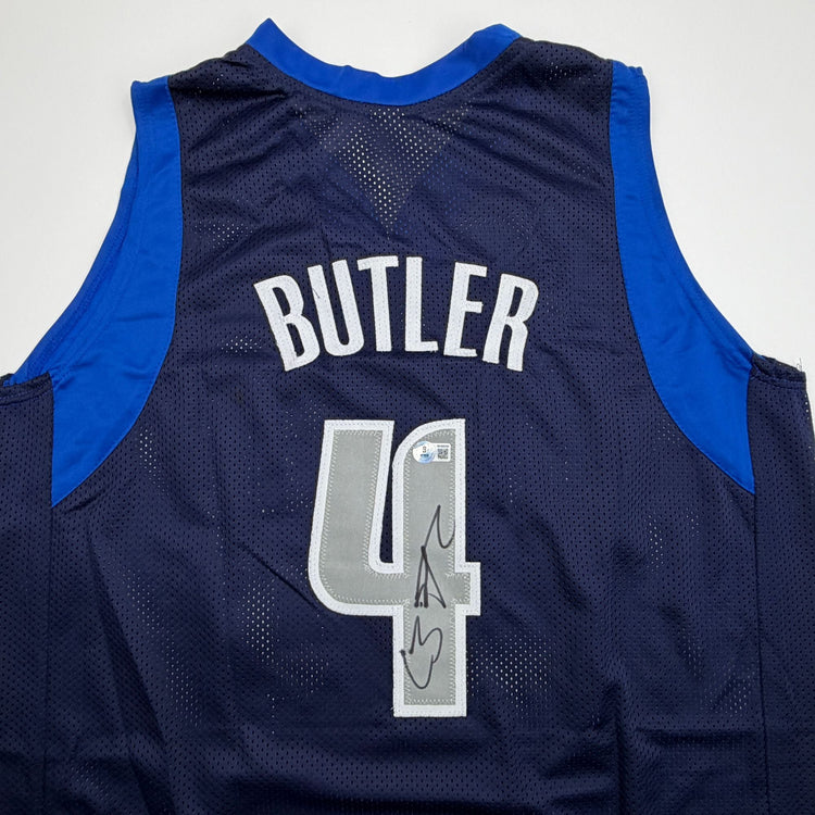 Autographed/Signed Caron Butler Dallas Blue Basketball Jersey Beckett BAS COA