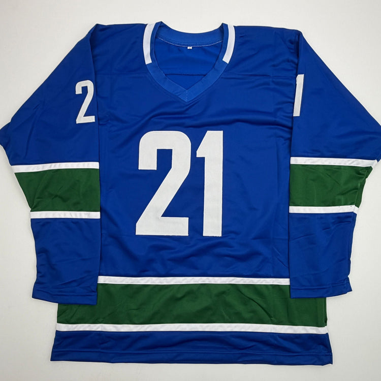 Autographed/Signed Nils Hoglander Vancouver Blue Hockey Jersey Beckett BAS COA