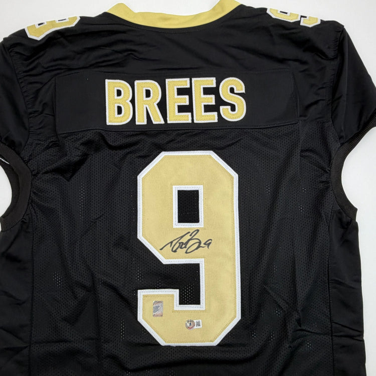 Autographed/Signed Drew Brees New Orleans Black Pro Cut Football Jersey Beckett BAS COA
