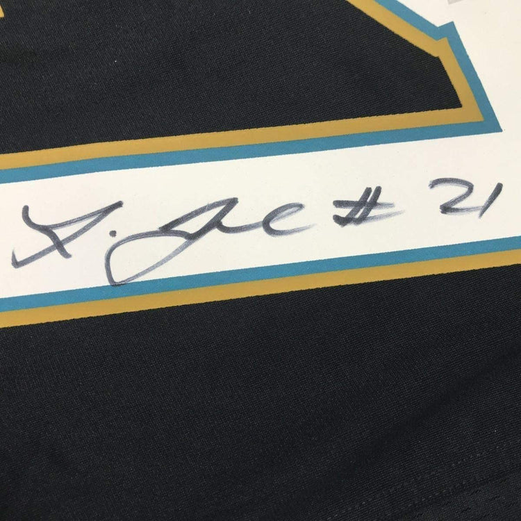 Framed Autographed/Signed Leonard Fournette 33x42 Jacksonville Black Football Jersey Fanatics COA