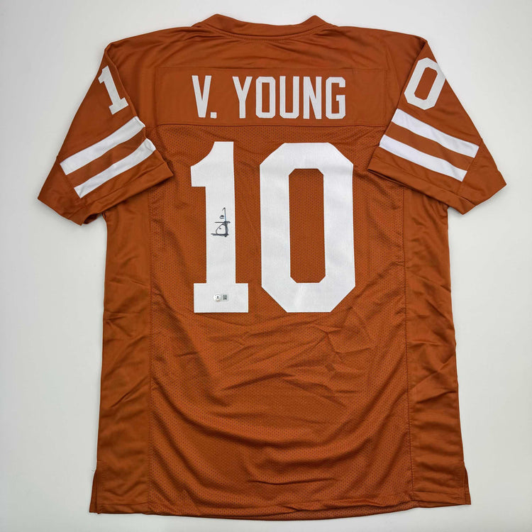 Autographed/Signed Vince Young Texas Orange College Football Jersey Beckett BAS COA
