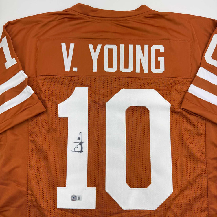 Autographed/Signed Vince Young Texas Orange College Football Jersey Beckett BAS COA