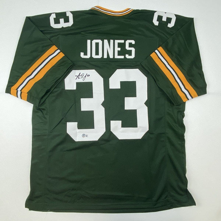 Autographed/Signed Aaron Jones Green Bay Green Football Jersey Beckett BAS COA