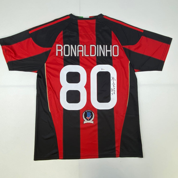Autographed/Signed Ronaldinho AC Milan Red/Black Soccer Futbol Jersey Beckett BAS COA