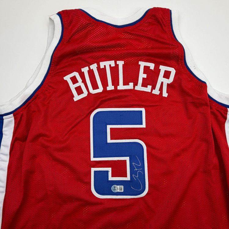Autographed/Signed Caron Butler Los Angeles Red Basketball Jersey Beckett BAS COA