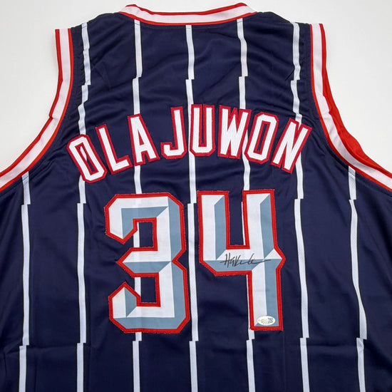 Autographed/Signed Hakeem Olajuwon Houston Blue Basketball Jersey JSA COA