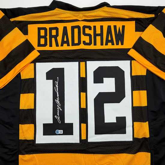 Autographed/Signed Terry Bradshaw Pittsburgh Bumble Bee Football Jersey Beckett BAS COA