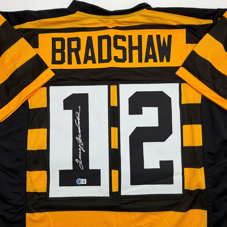 Autographed/Signed Terry Bradshaw Pittsburgh Bumble Bee Football Jersey Beckett BAS COA