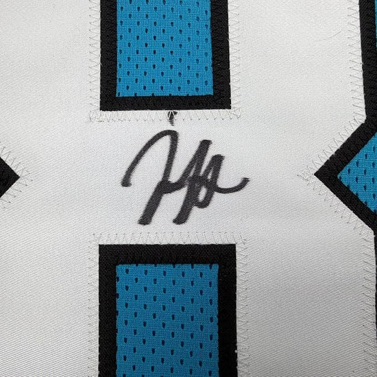 Framed Autographed/Signed Jaycee Horn 35x39 Carolina Blue Football Jersey Beckett BAS COA