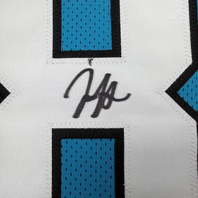 Framed Autographed/Signed Jaycee Horn 35x39 Carolina Blue Football Jersey Beckett BAS COA