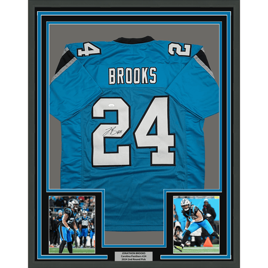 Framed Autographed/Signed Jonathon Brooks 35x39 Carolina Blue Football Jersey JSA COA