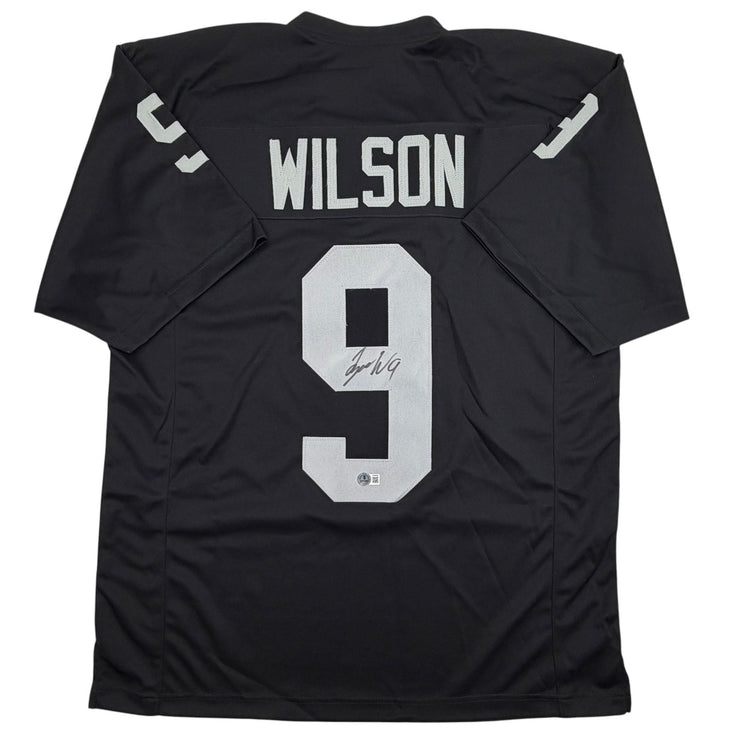 Autographed/Signed Tyree Wilson Oakland Las Vegas Black Football Jersey Beckett BAS COA