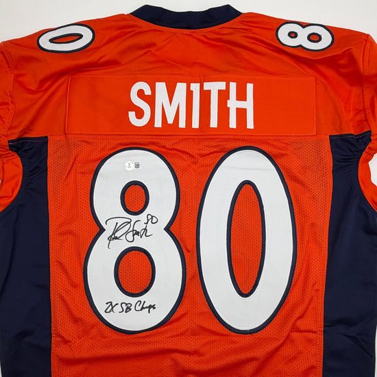 Autographed/Signed Rod Smith 2x SB Champs Denver Orange Pro Cut Football Jersey Beckett BAS COA