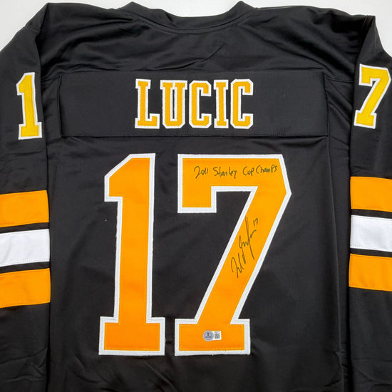 Autographed/Signed Milan Lucic Boston Black Hockey Jersey Beckett BAS COA