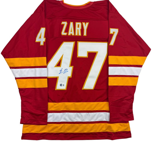Autographed/Signed Connor Zary Calgary Red Hockey Jersey Beckett BAS COA