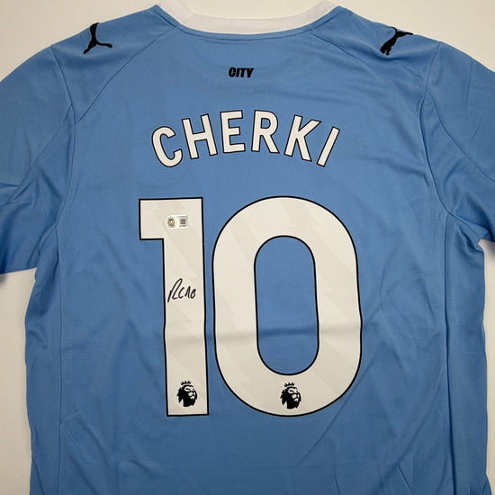 Autographed/Signed Rayan Cherki Manchester City Blue Soccer Futbol Jersey Beckett BAS COA