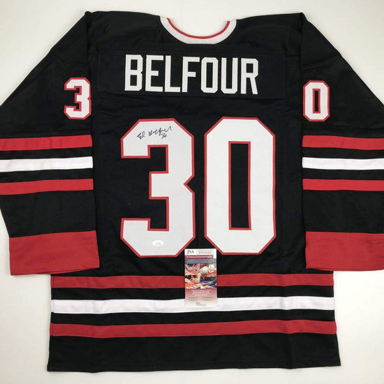 Autographed/Signed Ed Belfour Chicago Black Hockey Jersey JSA COA