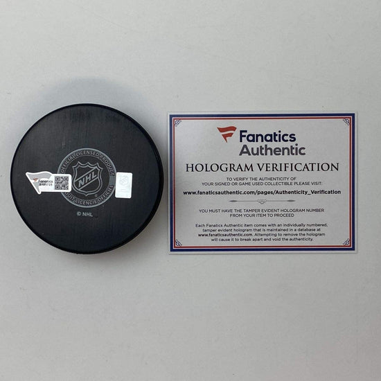 Autographed/Signed Nathan MacKinnon Colorado Avalanches Logo Hockey Puck Fanatics COA