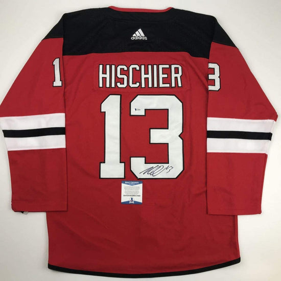 Autographed/Signed Nico Hischier New Jersey Red Hockey Jersey Beckett BAS COA