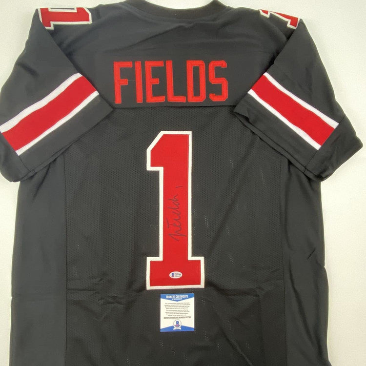 Autographed/Signed Justin Fields Ohio State Black College Football Jersey Beckett BAS COA