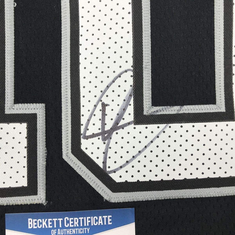 Framed Autographed/Signed DeMar DeRozan 33x42 San Antonio Black Basketball Jersey Beckett BAS COA