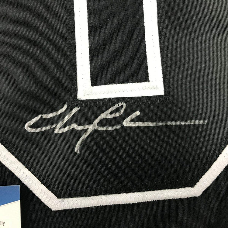 Autographed/Signed Chevy Chase Clark Griswold Christmas Vacation Movie Chicago Black Hockey Jersey Beckett BAS COA