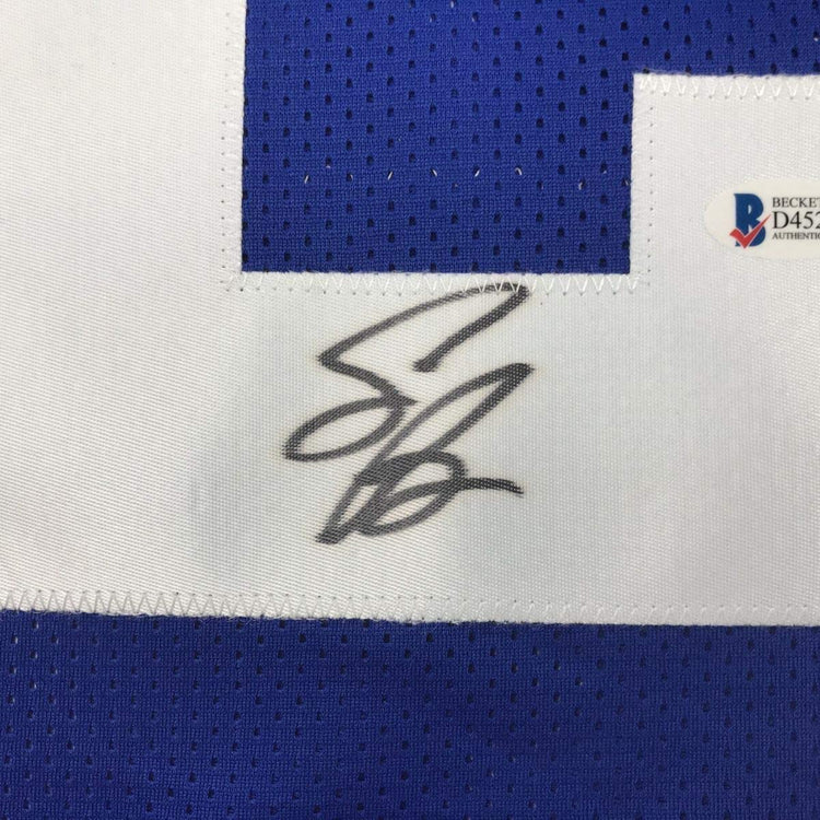 Framed Autographed/Signed Saquon Barkley 33x42 New York Blue Football Jersey Beckett BAS COA