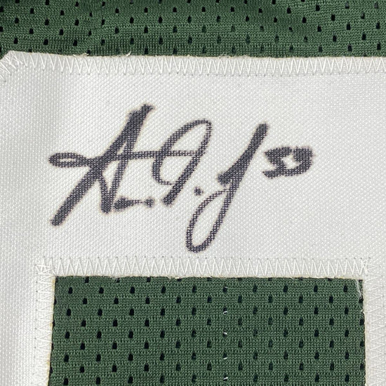Autographed/Signed Aaron Jones Green Bay Green Football Jersey Beckett BAS COA