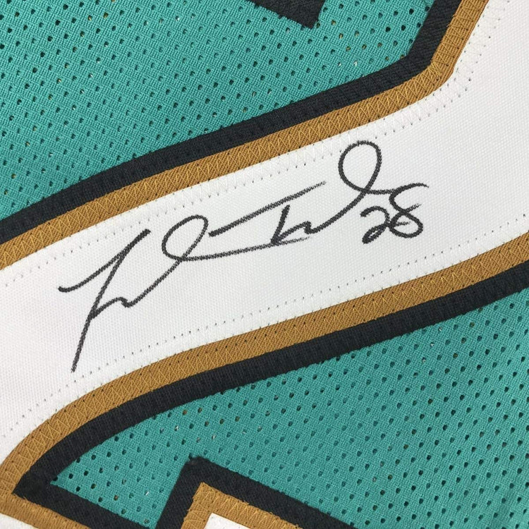 Framed Autographed/Signed Fred Taylor 33x42 Jacksonville Teal Football Jersey JSA COA