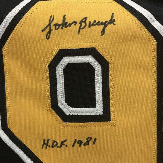 Framed Autographed/Signed John Johnny Bucyk HOF 1981 33x42 Boston Black Hockey Jersey JSA COA