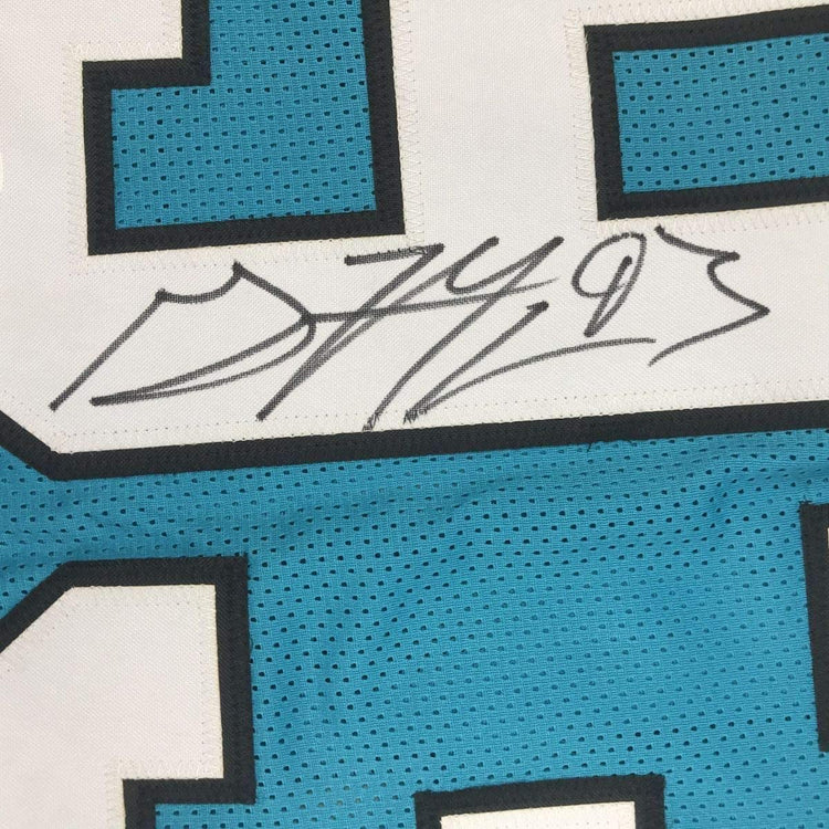 Framed Autographed/Signed Gerald McCoy 33x42 Carolina Blue Football Jersey Beckett BAS COA