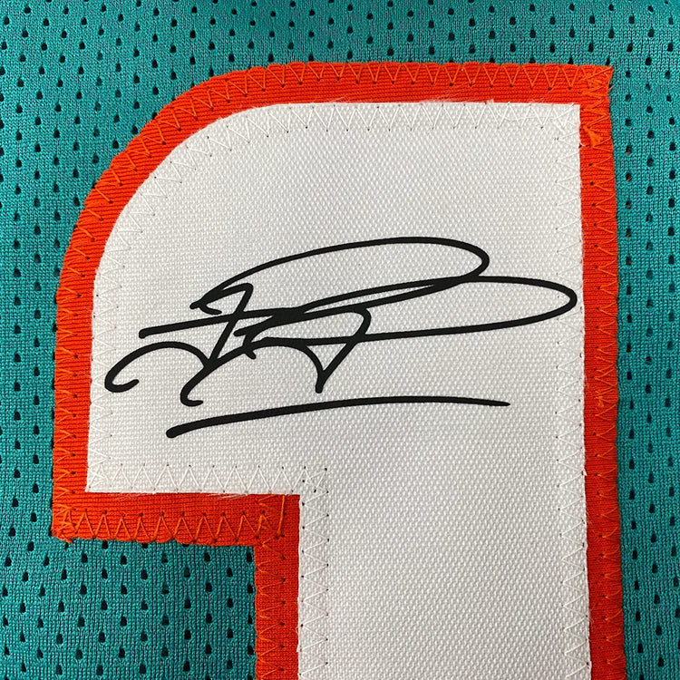 Framed Facsimile Autographed Tua Tagovailoa 35x39 Miami Teal Reprint Laser Auto Football Jersey