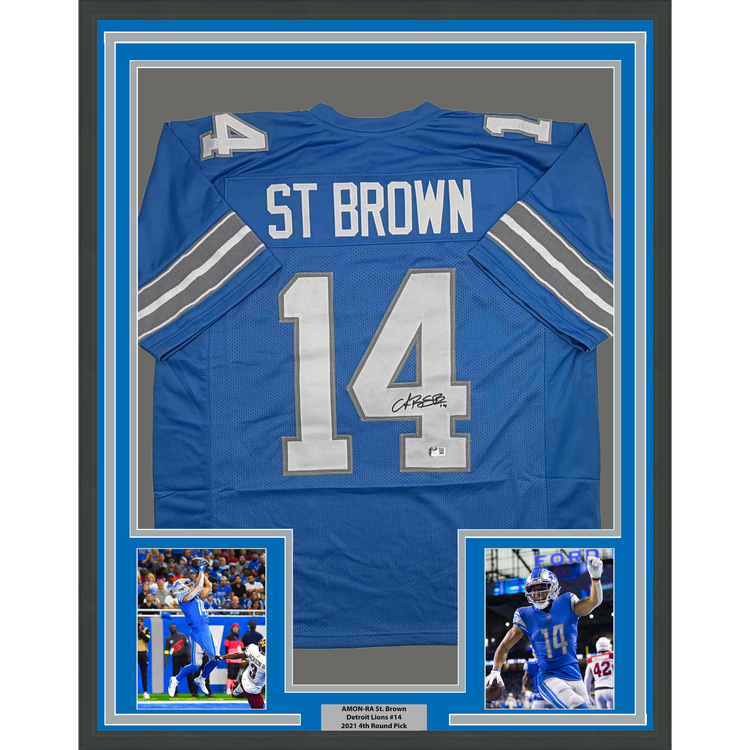 Framed Autographed/Signed Amon-Ra St. Brown 35x39 Detroit Current Blue Football Jersey Beckett BAS COA