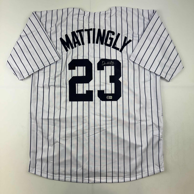 Autographed/Signed Don Mattingly New York Pinstripe Baseball Jersey Beckett BAS COA