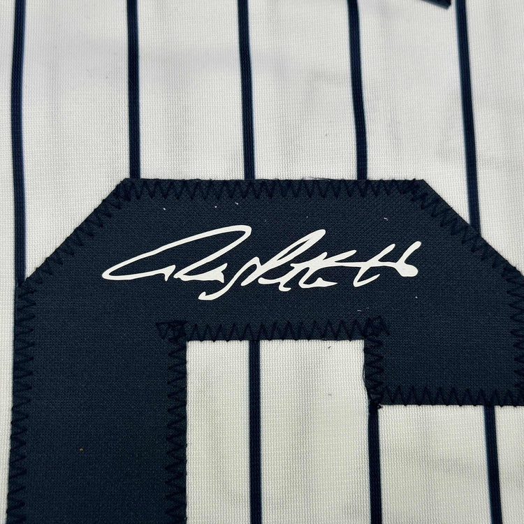 Framed Facsimile Autographed Andy Pettitte 35x39 New York Pinstripe Reprint Laser Auto Baseball Jersey