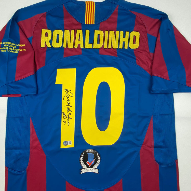 Autographed/Signed Ronaldinho Barcelona Blue/Red Soccer Jersey Beckett BAS COA
