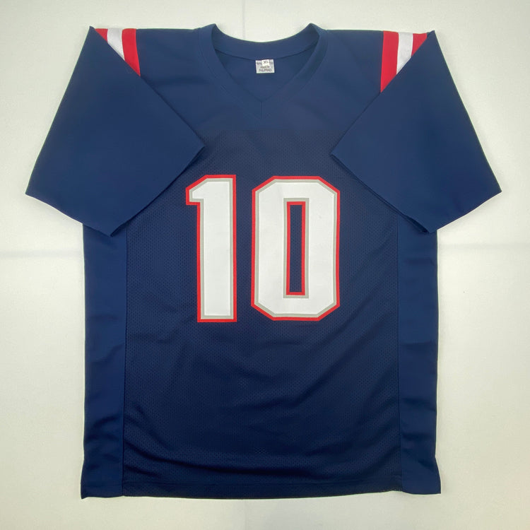 Autographed/Signed Mac Jones New England Blue Football Jersey Beckett BAS COA