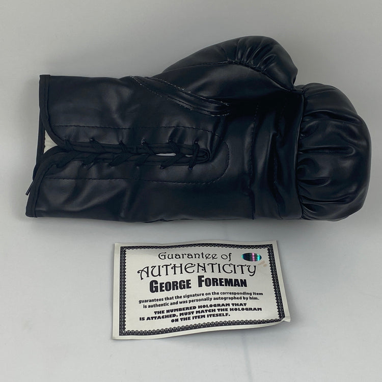 Autographed/Signed George Foreman Black Everlast Boxing Glove Athlete Hologram COA