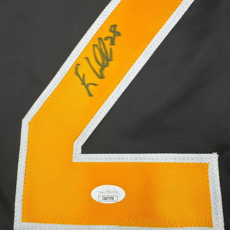 Autographed/Signed Elias Lindholm Boston Black Hockey Jersey JSA COA