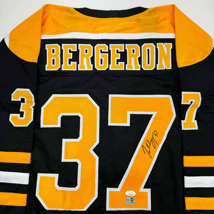 Autographed/Signed Patrice Bergeron Boston Black Hockey Jersey JSA COA