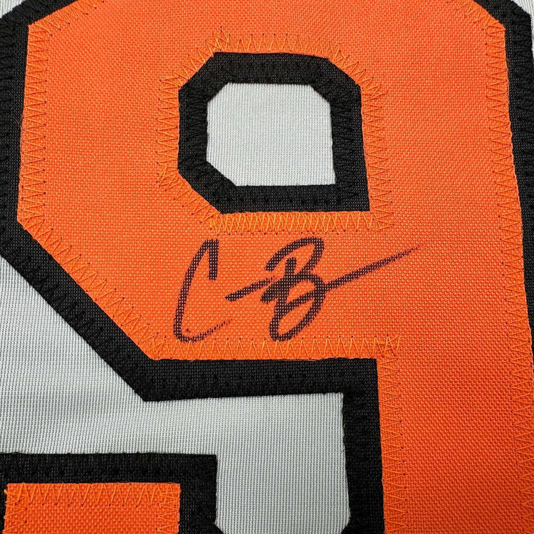 Framed Autographed/Signed Corbin Burnes 35x39 Baltimore Grey Baseball Jersey Beckett BAS COA