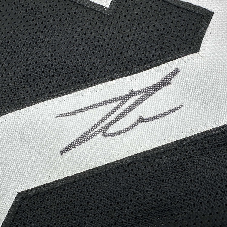 Framed Autographed/Signed Tyson Campbell 35x39 Jacksonville Black Football Jersey JSA COA