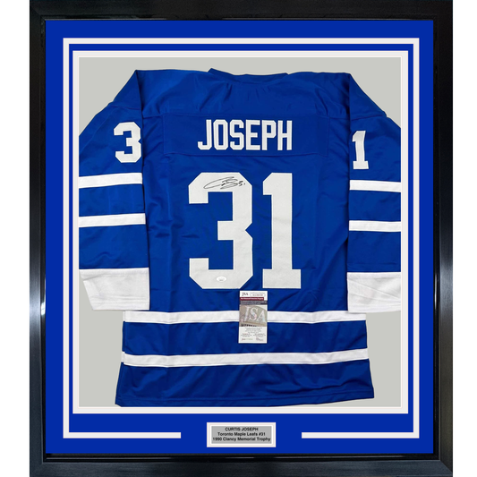 Framed Autographed/Signed Curtis Joseph 35x39 Toronto Blue Hockey Jersey JSA COA