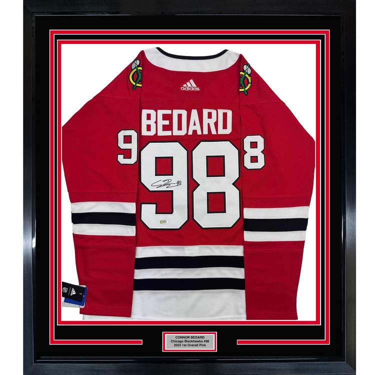 Framed Autographed/Signed Connor Bedard 35x39 Chicago Blackhawks Red Hockey Jersey PSA COA