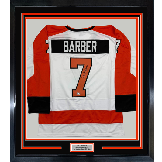 Framed Autographed/Signed Bill Barber 35x39 Philadelphia White Hockey Jersey Beckett BAS COA