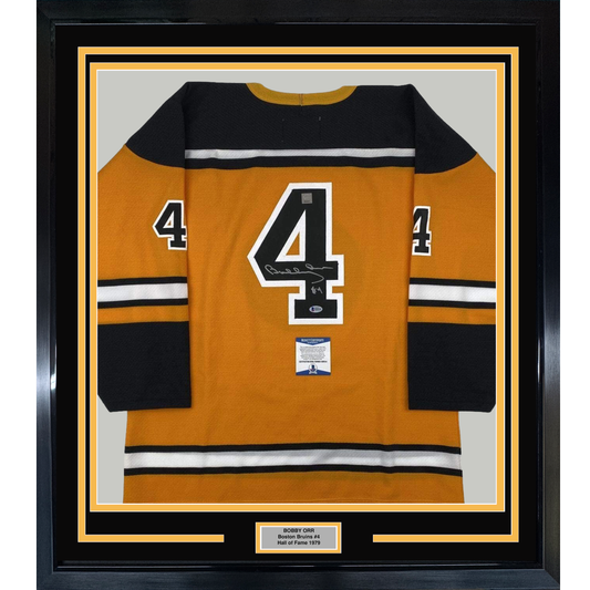 Framed Autographed/Signed Bobby Orr 35x39 Boston Yellow Hockey Jersey Beckett BAS & GNR COA