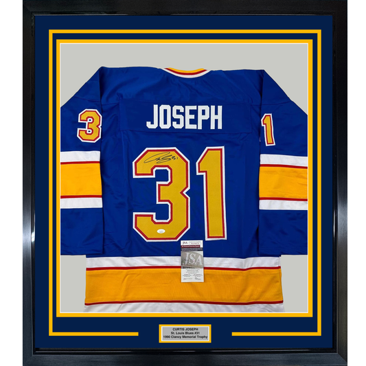 Framed Autographed/Signed Curtis Joseph 35x39 St. Louis Blue Hockey Jersey JSA COA