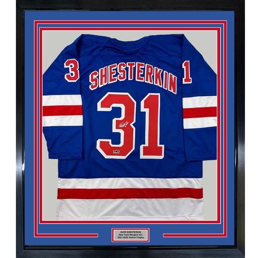 Framed Facsimile Autographed Igor Shesterkin 35x39 New York Blue Reprint Laser Auto Hockey Jersey
