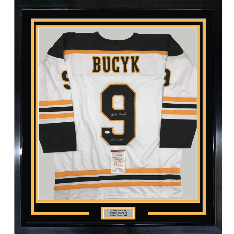Framed Autographed/Signed Johnny John Bucyk HOF 1981 35x39 Boston White Hockey Jersey JSA COA