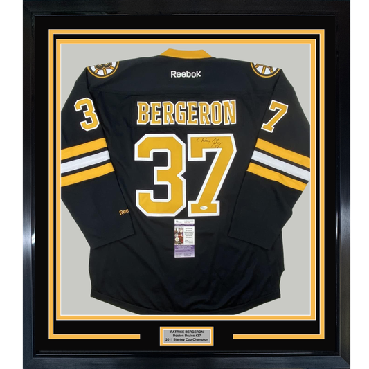 Framed Autographed/Signed Patrice 35x39 Bergeron Personalized To Anthony Boston Bruins Black Hockey Jersey JSA COA